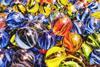 A mix of coloured glass marbles