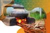 Photo of a traditional cooking stove that burns wood under a cooking pot