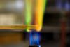 Copper solution soaked splint in Bunsen burner flame.
