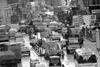 A black and white photo of a traffic jam in London in the 1970s