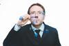 A man blowing coloured bubbles