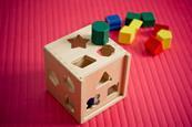 Colourful wooden shape sorter