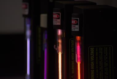 A photograph of glass emission tubes containing air, nitrogen, helium and neon, used for producing atomic emission spectra