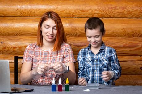 photo of boy and mother experimenting with mixtures and solutions