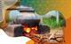 Photo of a traditional cooking stove that burns wood under a cooking pot