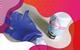 Photo of bicarbonate of soda, a teaspoon and a purple plastic glove