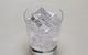 States of matter - glass of carbonated liquid with ice