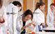 Students performing a titration experiment