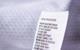 Polyester fabric clothing label with laundry instructions