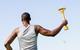 Athlete holding a fire torch