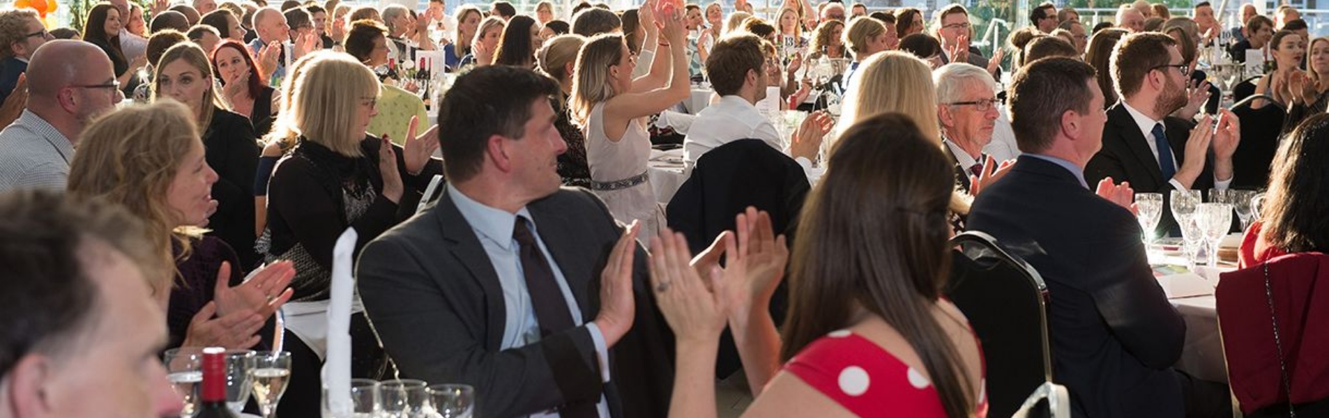 People celebrating awards