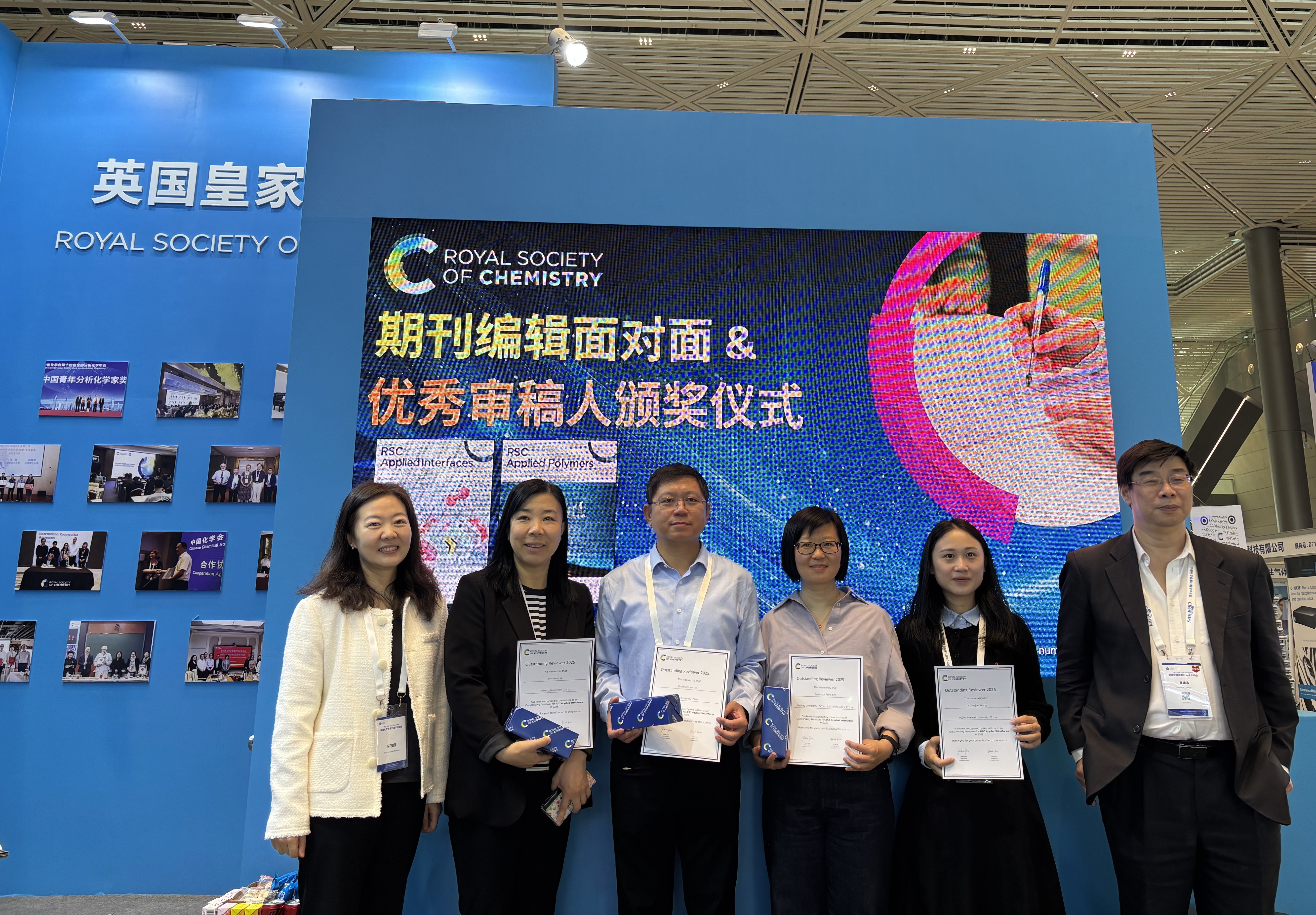 a group of people holding papers