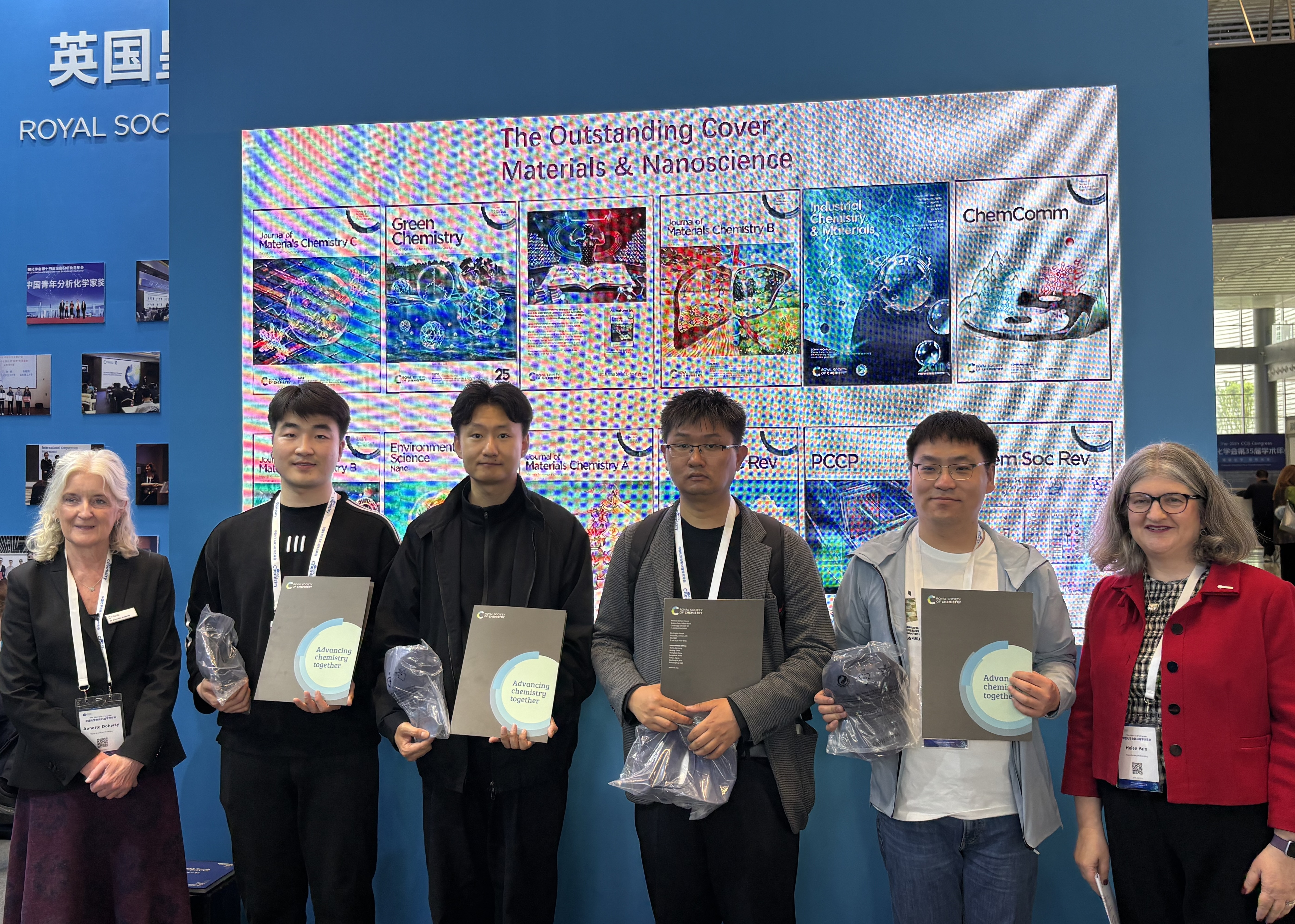 Cover Competition - 2 (RSC in China 2026) a group of people holding papers