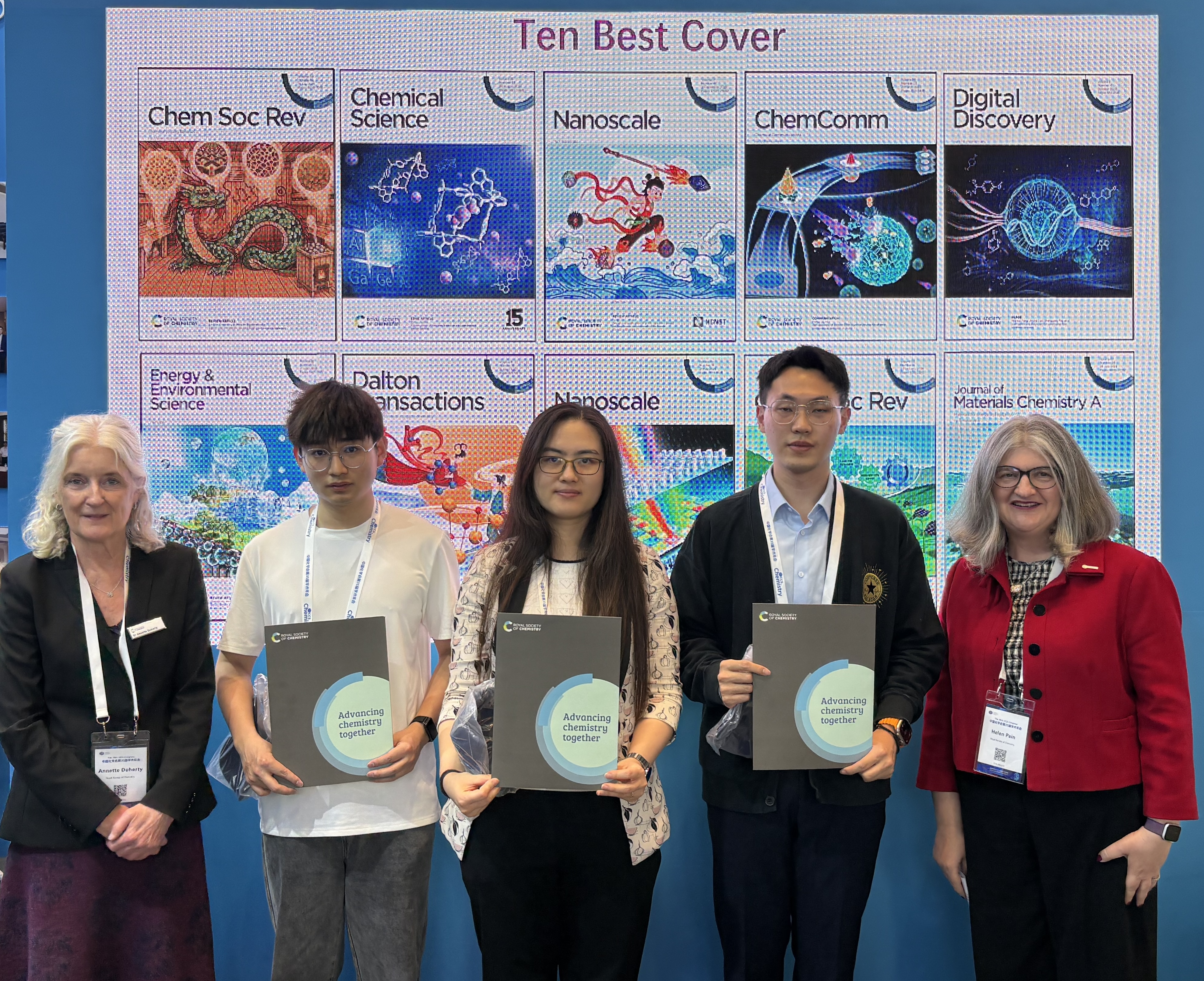 Cover Competition - 1 (RSC in China 2026) a group of people holding papers