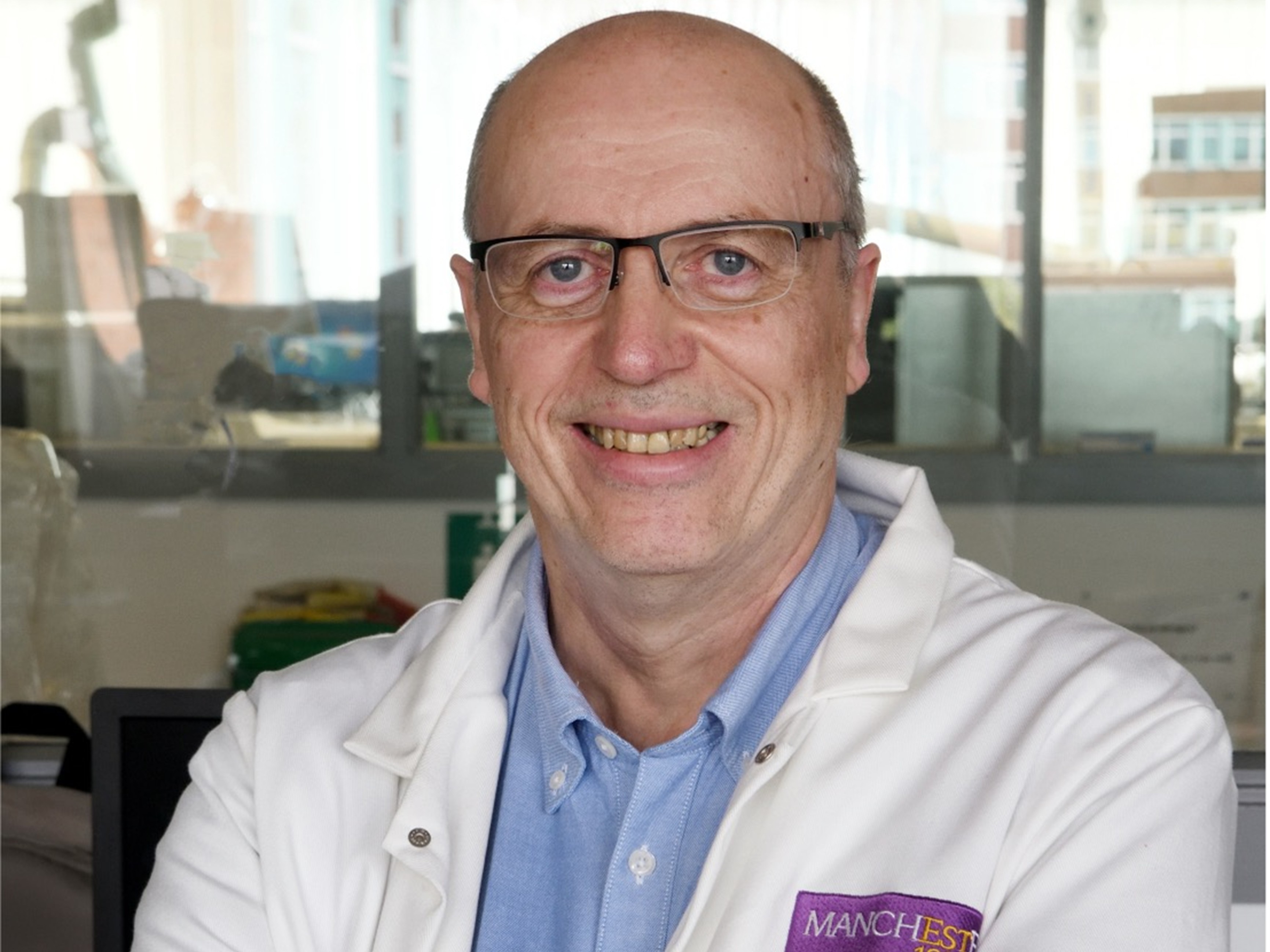 a man in a white coat