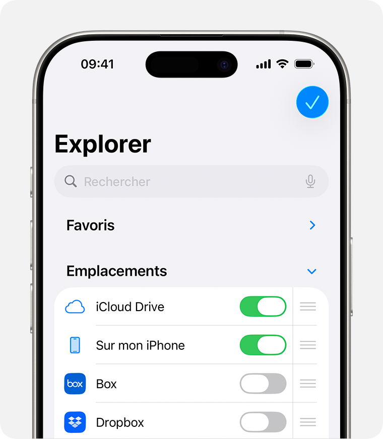 Un iPhone doté d’iOS 26 présente l’onglet Explorer d’iCloud Drive après que vous avez touché Modifier. Sous Emplacements, les options iCloud Drive, Sur mon iPhone, Box et Dropbox sont répertoriées.