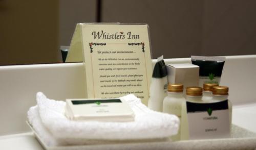 a counter top with a bunch of products on it at Whistler's Inn in Jasper