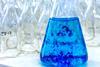 Blue dye in conical flask
