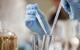An image showing a student using pipettes