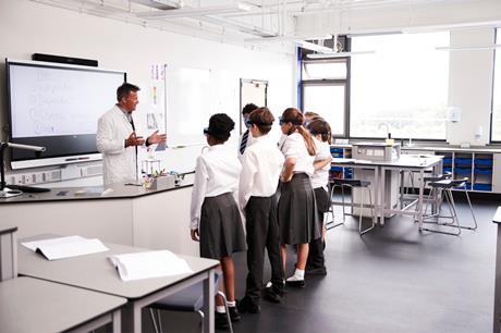 Teacher in school laboratory