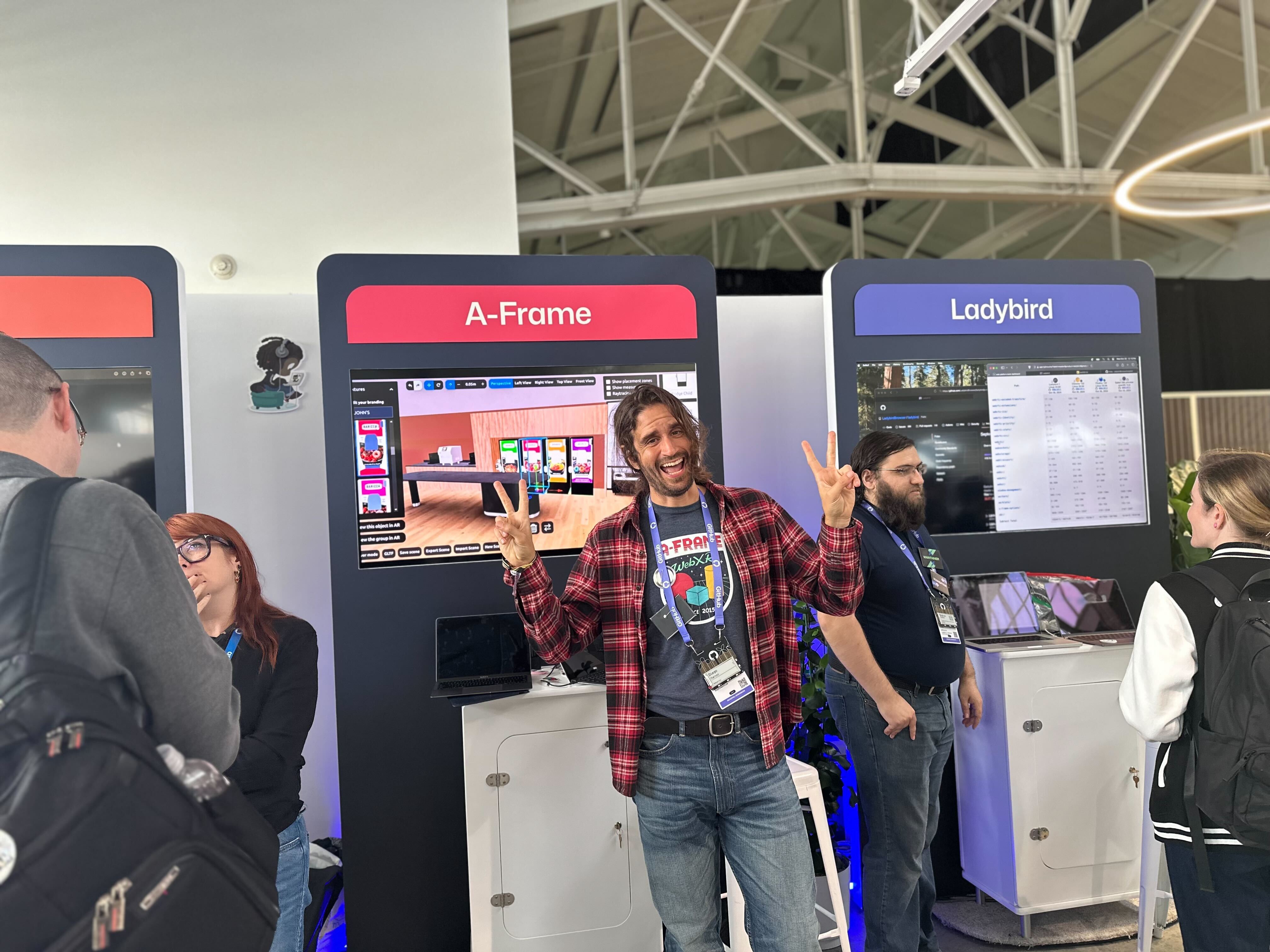 Photograph of @dmarcos casually bending reality with A-Frame in the Open Source Zone last year ✌🏻