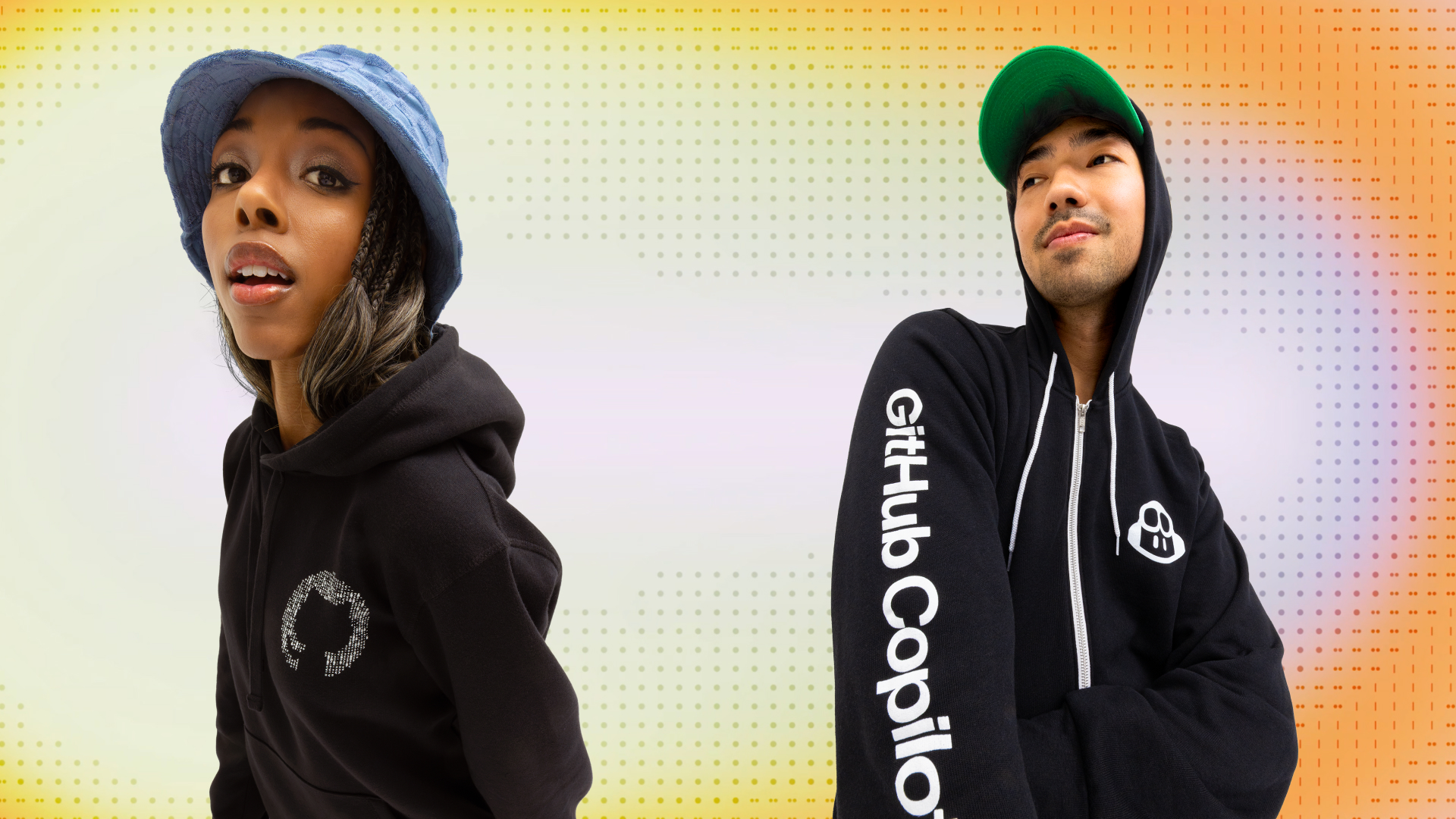 An image of a woman wearing a hoodie with the Octocat in ASCII and a man wearing a GitHub Copilot hoodie.