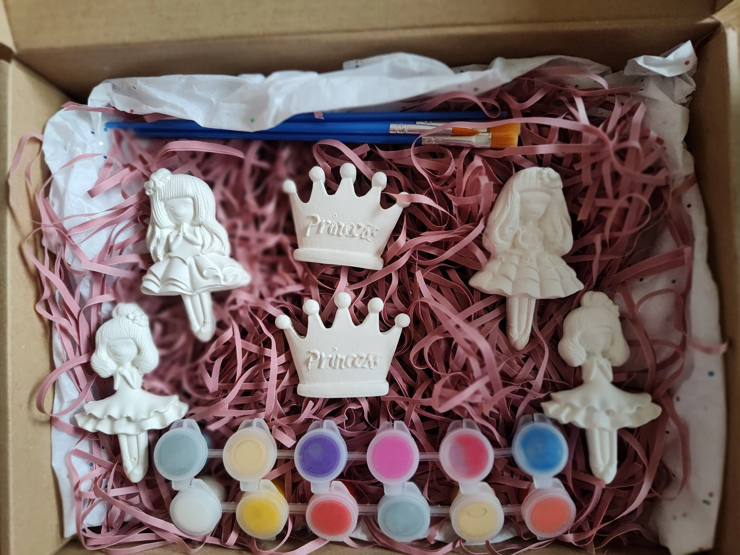Four little princess, two princess crowns, paint strip and two paint brushes