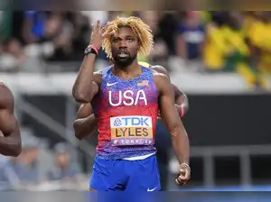 Lyles wins his fourth 200-meter world title. Jefferson-Wooden completes a sprint sweep