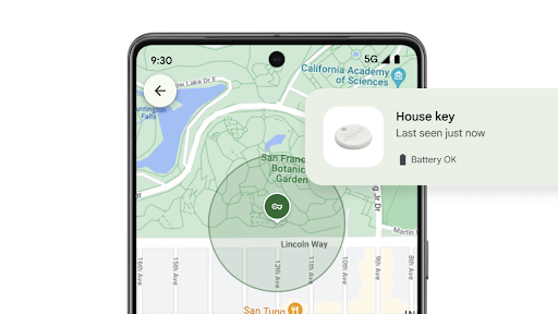 Using the Find My Device app on an Android phone to locate a tracker tag attached to a house key.