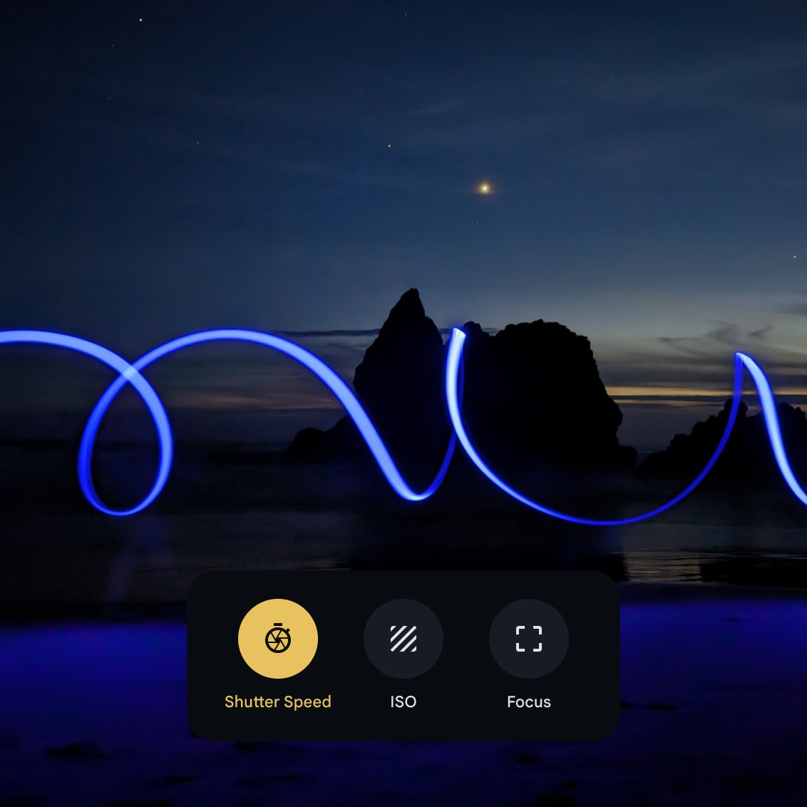 Four options are displayed on Pixel 8 Pro's camera: shutter speed, ISO, and focus selection.
