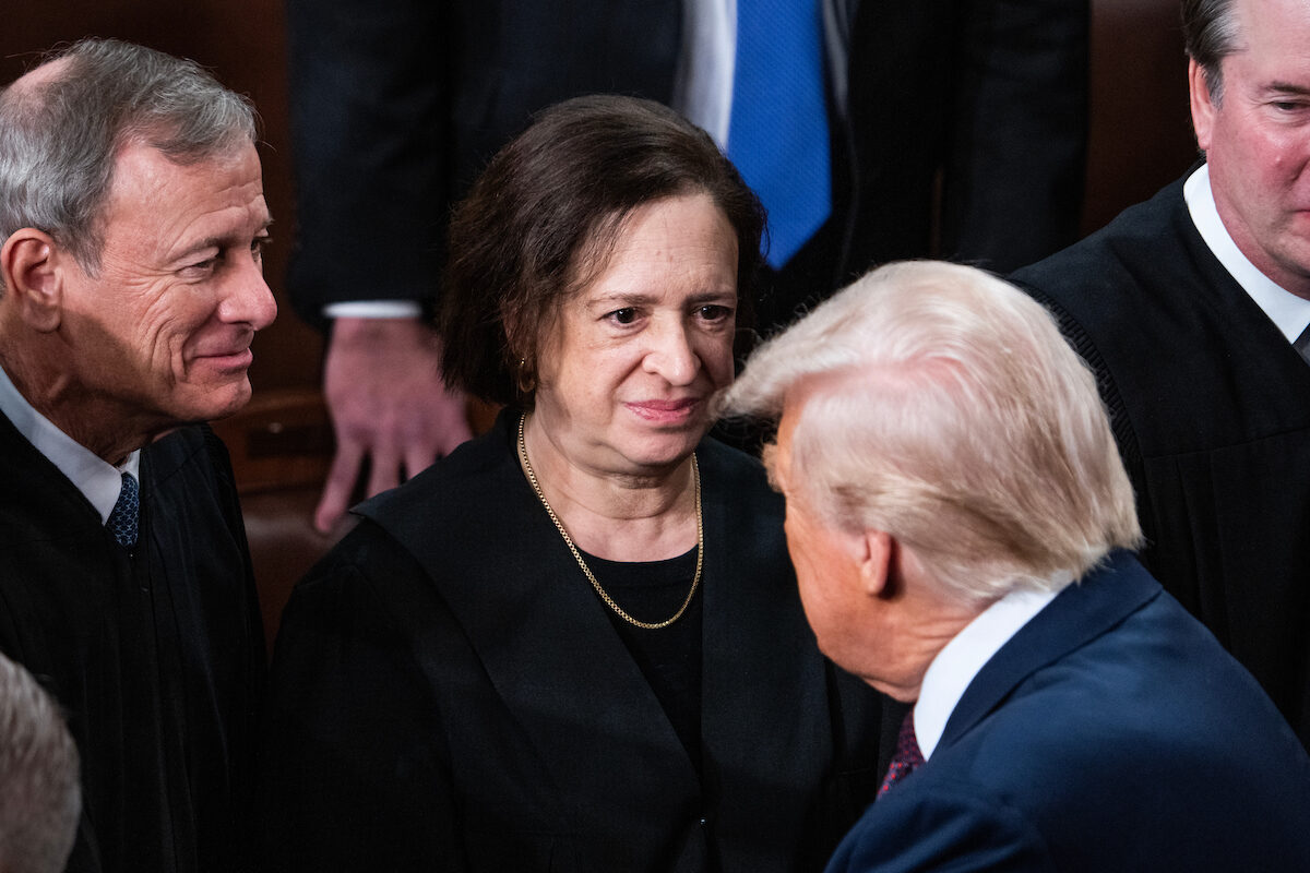Supreme Court Chief Justice John G. Roberts Jr. and Justice Elena Kagan greet President Donald Trump after his address to  Congress on  March 4. The court has found itself in an increasingly prominent space in a series of cases concerning Trump's administration. 