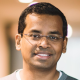 Headshot of article author Arun Ulagaratchagan