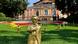 Golden Wagner figures stand on the lawn in front of the Festspielhaus. Golden Wagner figures stand on the lawn in front of the Festspielhaus.