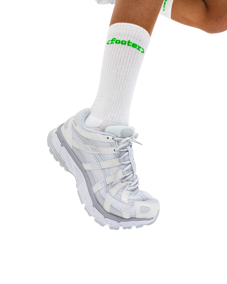 Photo of GitHub footer socks on model