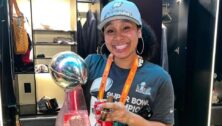 Autumn Lockwood with Super Bowl trophy.