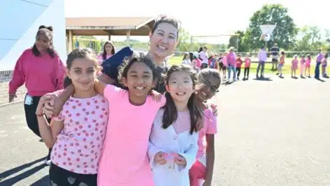 Spring City Elementary School principal Sue Choi with several elementary school students.