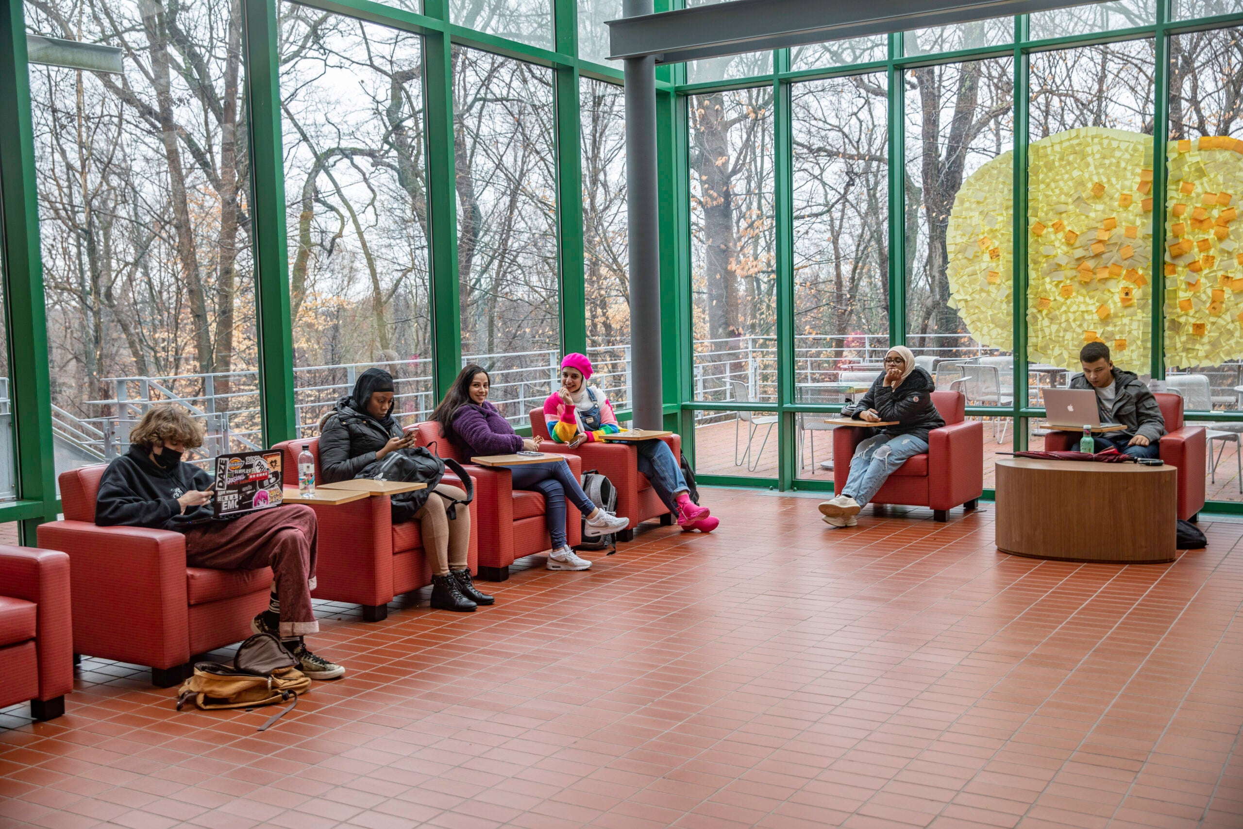 Getting down to work in the light-filled Academic Building cafe.