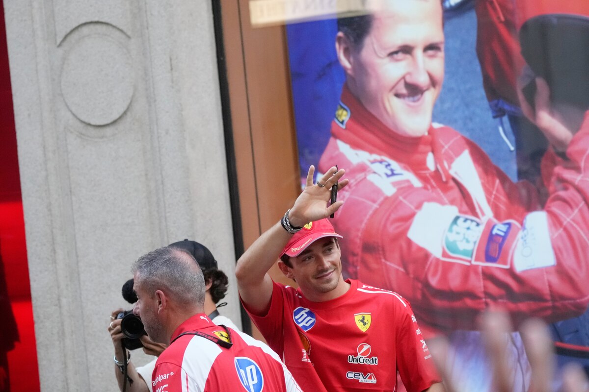 Ferrari driver Charles Leclerc of Monaco greets fans outside the Ferrari flagship store in Milan, Italy , Wednesday, Sept. 2, 2026 ahead of Sunday's Formula one Italy Grand Prix. (AP Photo/Luca Bruno)