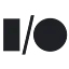 The letters “I/O” in black