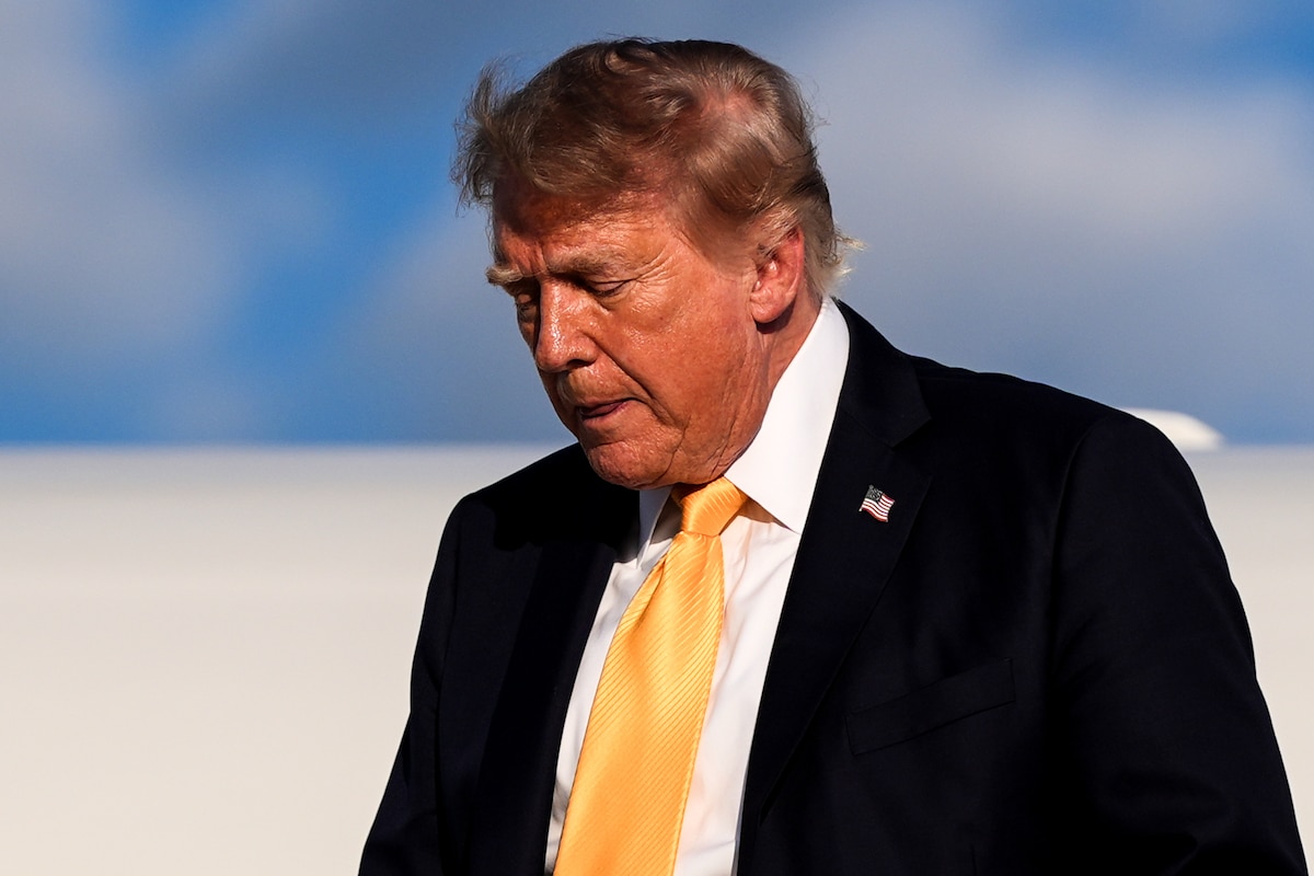 President Donald Trump disembarks Air Force One at Morristown Airport, Friday, Sept. 4, 2026, in Morristown, N.J. (AP Photo/Julia Demaree Nikhinson)