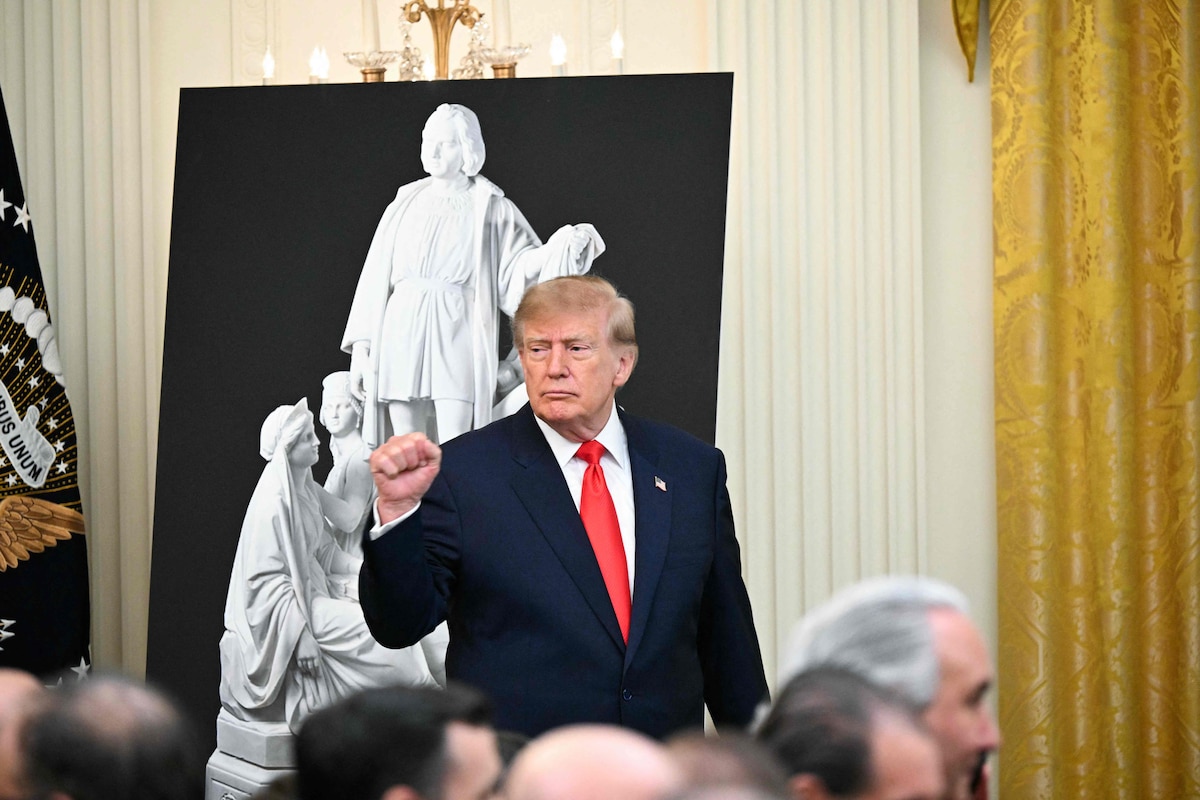 US President Donald Trump gestures after speaking at a Columbus Day celebration in the East Room of the White House in Washington, DC, on October 9, 2026. (Photo by Alex WROBLEWSKI / AFP)