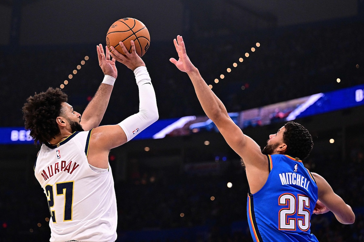 OKLAHOMA CITY, OKLAHOMA - OCTOBER 22: Jamal Murray #27 of the Denver Nuggets shoots against Ajay Mitchell #25 of the Oklahoma City Thunder during the first half at Paycom Center on October 22, 2026 in Oklahoma City, Oklahoma. NOTE TO USER: User expressly acknowledges and agrees that, by downloading and or using this photograph, User is consenting to the terms and conditions of the Getty Images License Agreement. Joshua Gateley/Getty Images/AFP (Photo by Joshua Gateley / GETTY IMAGES NORTH AMERICA / Getty Images via AFP)