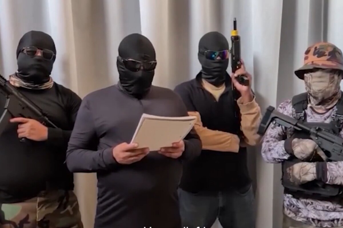 Quatre hommes armés menacent directement la cible de l'attaque d'Overasselt dans une vidéo.