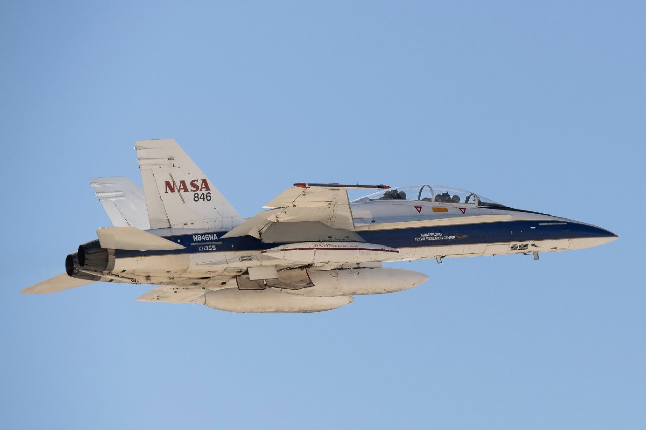 F/A-18 research aircraft in flight with blue sky