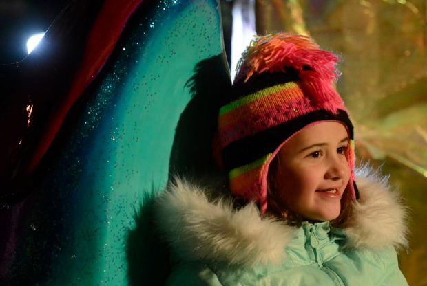 Kylee Brown, sister of Laney Brown, sits in the lap...